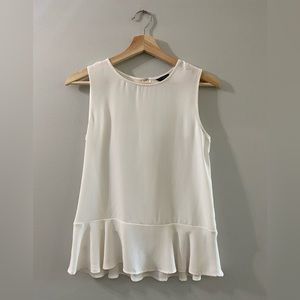 Ann Taylor white sleeveless blouse with ruffle on bottom